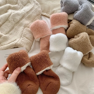 Chaussettes en laine épaisses pour femmes avec doublure polaire en plusieurs coloris hiver