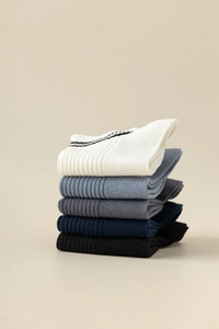 Detailed view of 5-pack men's ribbed cotton boat socks in gradient neutral colors