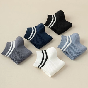 Five pairs of men's striped low-cut cotton socks in diverse colors with a 45-degree view