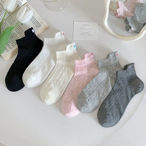 Set of six pairs of women's mesh ankle socks with cute bow accents and ribbed patterns