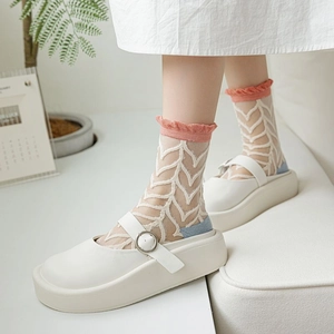 Chaussettes résille blanches pour femmes avec bords roses volantés et motifs flèches