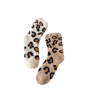 Thick leopard print coral fleece socks in cream and light brown for winter warmth