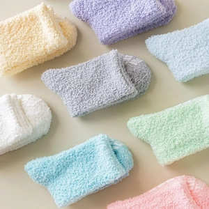 Warm fuzzy coral fleece socks for women with non-slip grips in assorted macaron colors