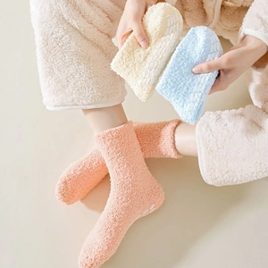 Thick fuzzy coral fleece socks for women with non-slip silicone grippers in candy colors