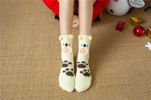 Detail of coral fleece socks with 3D cartoon koala ears and cute embroidery pattern