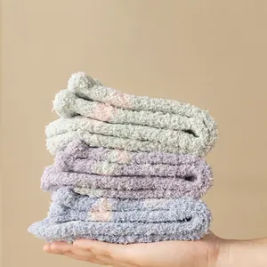Set of three floral coral fleece thick warm socks in pastel green purple and blue colors