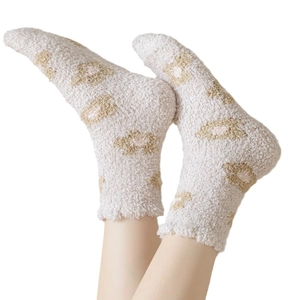 Plush leopard print winter socks in soft coral fleece for warmth and comfort