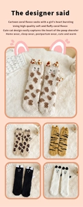 Close-up of five colorful coral fleece crew socks with cute cartoon cat ear designs
