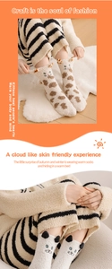Detailed view of cozy coral fleece socks featuring cute cat and giraffe animal designs