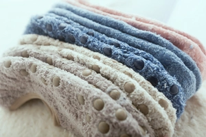 Close-up of thick non-slip thermal home socks with anti-skid silicone dots on the sole