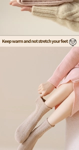 Detail of cable knit texture on thick thermal socks in warm beige for winter