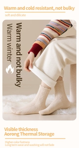Detailed close-up of warm off-white thermal socks with diamond knit texture and ruffle trim