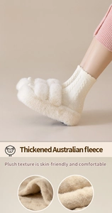 Close-up of thick Australian cashmere cross-strap slippers with warm plush texture