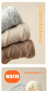 Close-up of thick fleece lining on thermal winter socks showing visible warm texture