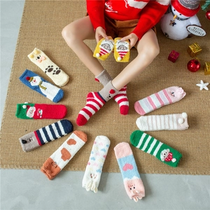 Chubby coral fleece Christmas socks featuring 3D cartoon Santa and reindeer designs