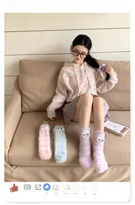 Thick coral fleece socks for winter featuring cute cartoon 3D eyes in pastel colors