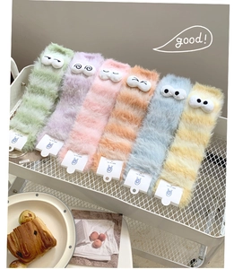Set of six macaron-colored striped coral fleece socks with 3D cartoon eyes decoration