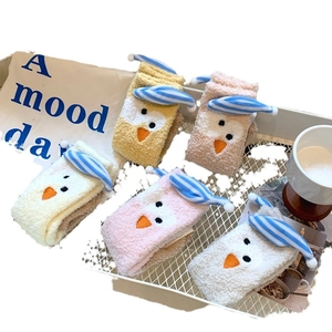 Five pairs of fluffy coral fleece socks with cute cartoon 3D bird design in soft colors