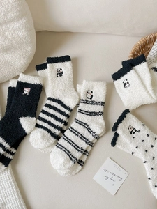 Thick coral fleece socks featuring panda embroidery, stripes, and polka dot patterns