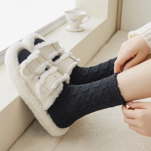 Plush white faux fur slippers with cozy thick knit socks for winter home comfort