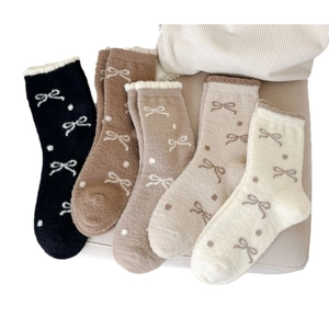 5-pack thick thermal fuzzy socks for women with bow patterns and plush cuffs in mixed colors