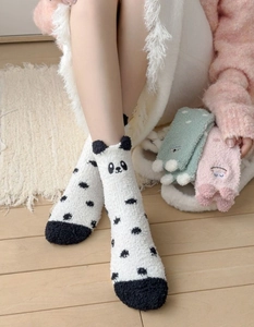 Detailed texture of thick coral fleece socks with cute 3D animal embroidery designs