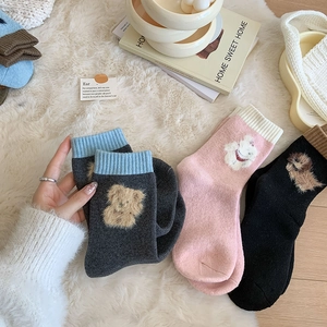 Thick wool blend socks for winter featuring 3D cartoon bear patch and ribbed cuff detail