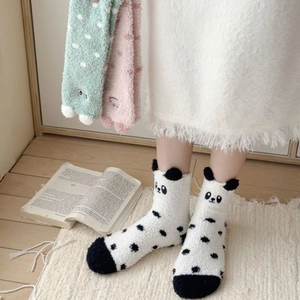 Cozy coral fleece mid-calf socks with cute 3D panda design and warm winter patterns
