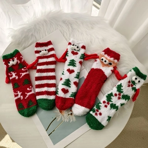 Detailed set of thick coral fleece Christmas socks with 3D eyes and tiny hand decorations