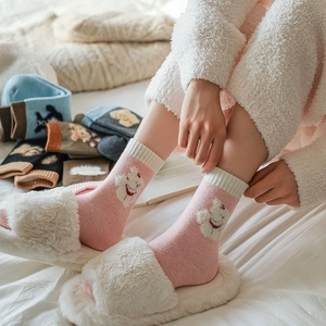 Detailed texture of thick wool socks with cute cartoon bear pattern and soft ribbed cuffs