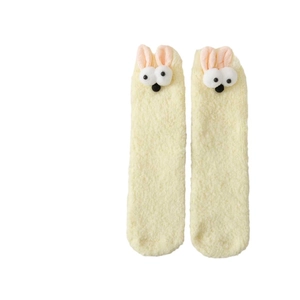 Soft yellow coral fleece thermal socks with cute 3D bunny ears and plush texture