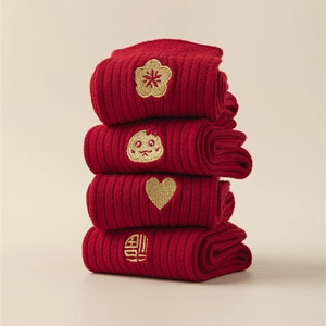 Set of 4 red ribbed cotton socks with gold embroidery of zodiac snake and lucky symbols