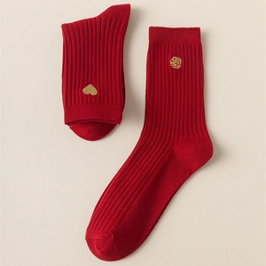 Festive red cotton mid-calf socks with gold heart and lucky symbol embroidery for New Year