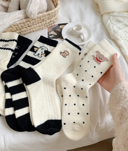 Thick coral fleece socks featuring cute dog embroidery and various cozy patterns