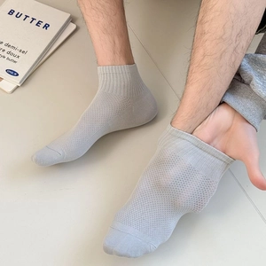 Close-up of light grey breathable mesh ankle socks for men showing premium cotton texture