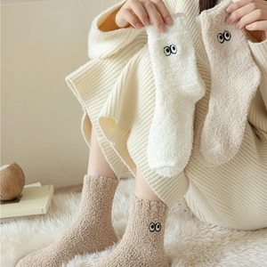 Calze invernali spesse in pile corallo con ricamo di occhi in beige e avena