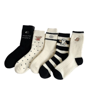 Five pairs of thick winter coral fleece cartoon dog socks in black and beige patterns