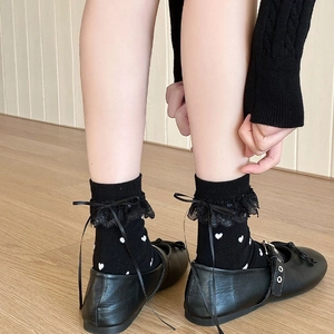 Japanese Lolita style black lace socks with ribbon bows and white heart jacquard patterns