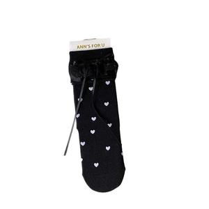 Lolita style black heart pattern socks with lace trim and ribbon bows on white background