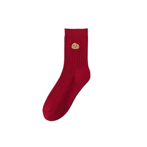 Red cotton crew socks with ribbed texture and yellow cartoon character embroidery for Year of Snake