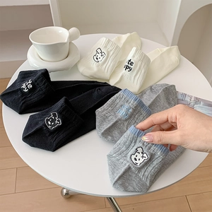 Detailed embroidery of a cartoon puppy and Happy text on cotton ankle socks set