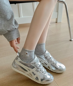 Close-up of cute dog embroidery detail on breathable cotton ankle socks for women
