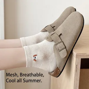 Khaki suede Boston style clogs paired with cute cartoon dog embroidery mesh socks