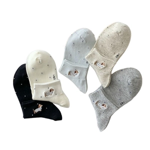 Breathable cotton socks with colorful dachshund embroidery in four assorted solid colors