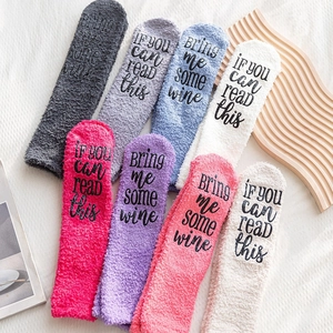 Colorful fuzzy socks with 'Bring Me Some Wine' anti-slip lettering in multi-color set