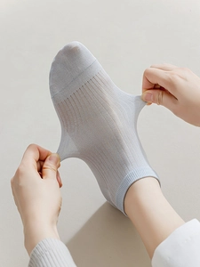 Detailed macro view showing the high elasticity and breathable mesh of modal cotton socks