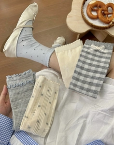 Assorted Japanese style cotton socks with floral prints and bow tie details