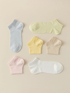 Close-up of thin breathable modal mesh socks in five pastel macaron colors with ribbed texture