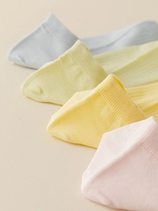 Close-up of pastel modal cotton socks featuring breathable mesh and ribbed texture
