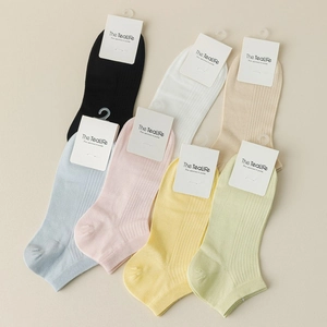 Set of pastel modal mesh ankle socks in seven soft colors with fine ribbed texture